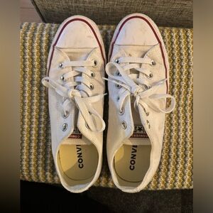 Women’s White Converse sneakers.